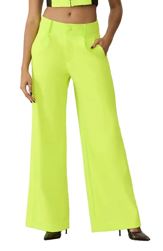 Luxe Performance Flare Pant In Acid Lime