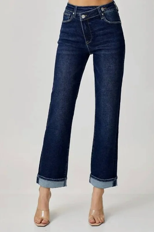 Mid Rise Cross Over Straight Leg Jeans In Medium Blue